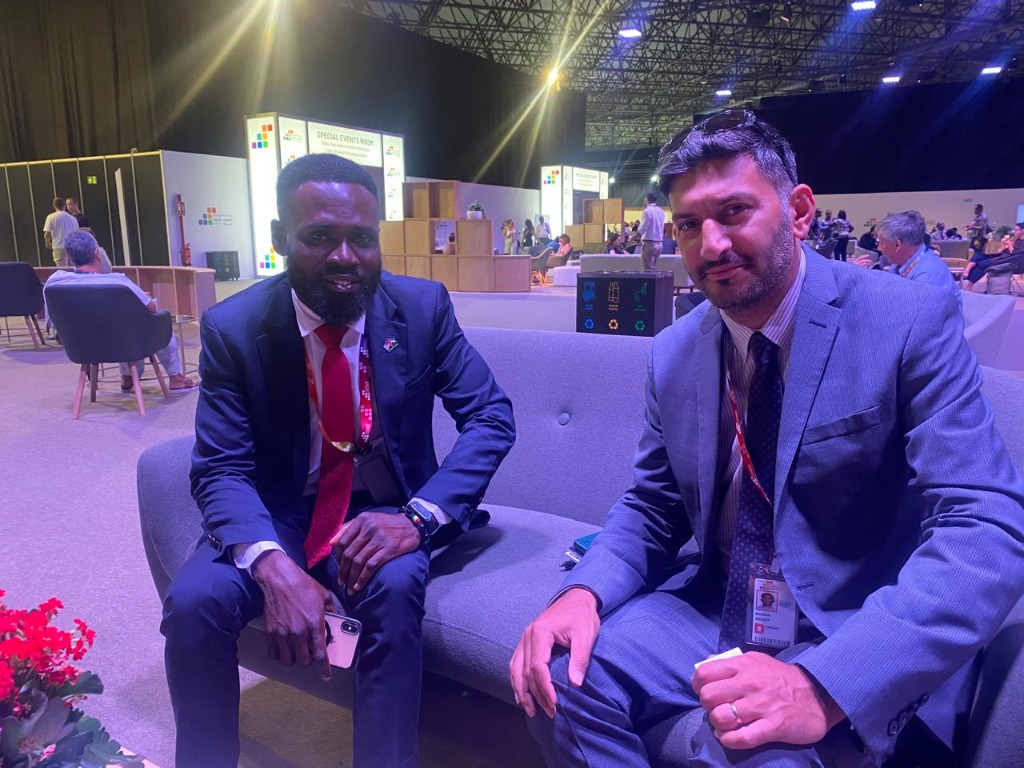 Isaac at the United Nations Development Programme (UNDP) Summit Booth